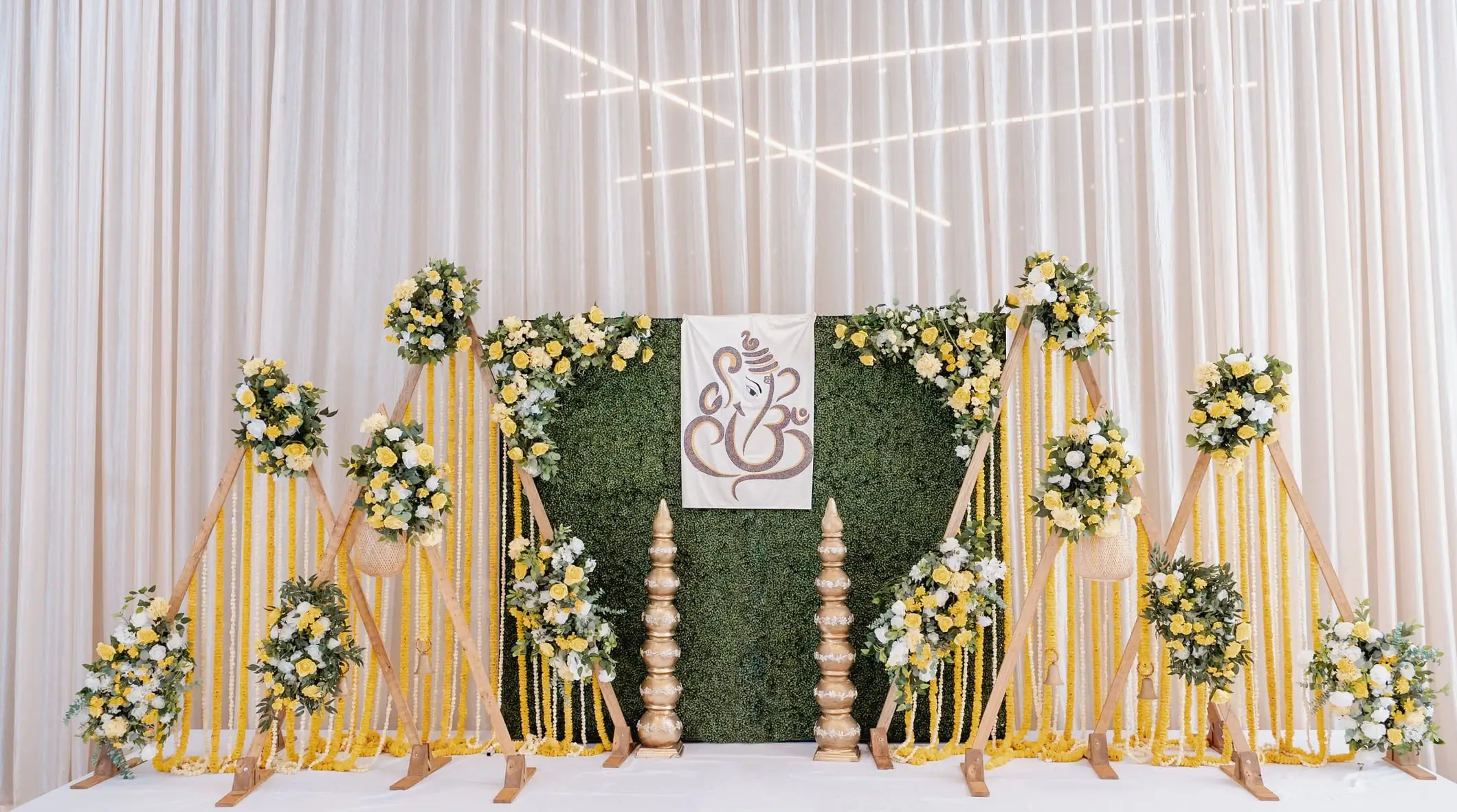 Intimate Grah Shanti puja with marigold and brass altar